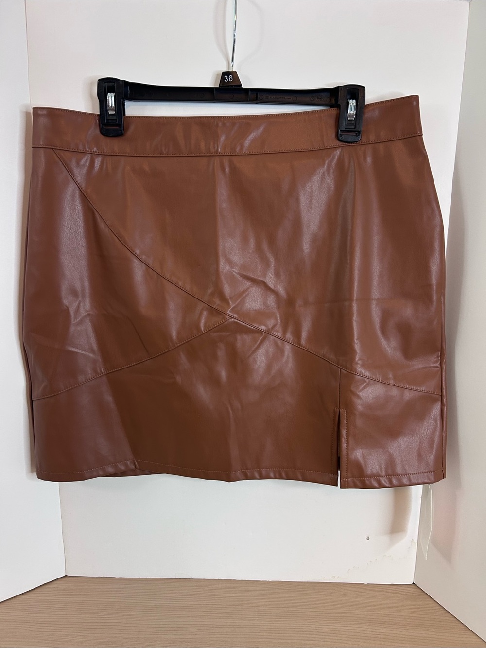 Faux Leather Mini Skirt in Brown with shorts attached.
